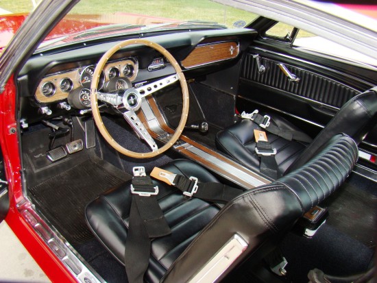 The interior is basic but was terrific in its day. Note the after marked high performance seatbelts.