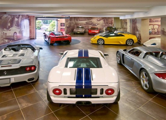The toys in this garage and the finish of the garage tell the story of this man's Cave.
